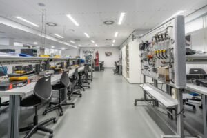 Spacious modern laboratory with workstations and equipment, ideal for scientific research and experiments.